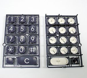 Le processus de moulage par injection de double de clavier de téléphone partie noir et blanc